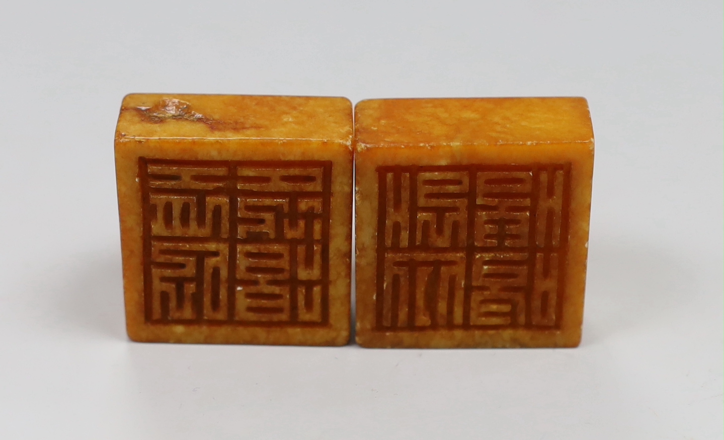 Three Chinese archaistic stone seals and four other carvings, the largest 10cm high (7)